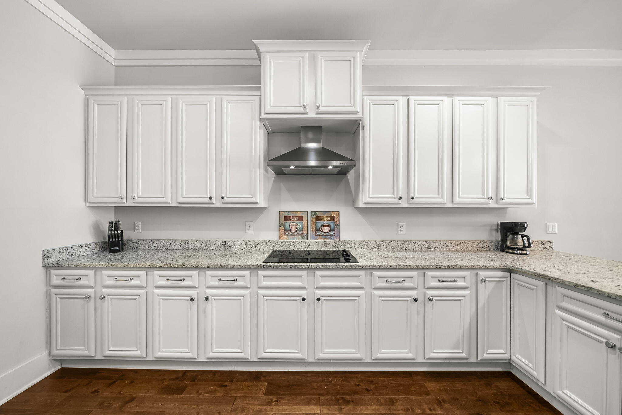 209 Blakely Drew Boulevard Santa Rosa Beach, FL 32459 - Photo 8 of 45 a kitchen with stainless steel appliances granite countertop a sink and cabinets