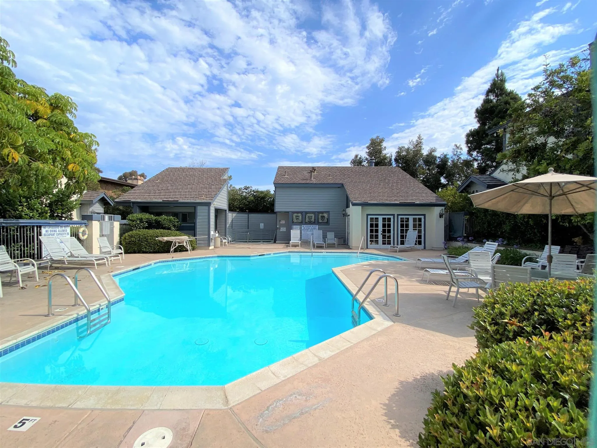 3195 Morning Way La Jolla, CA 92037 - Photo 18 of 18 a view of a house with swimming pool and sitting area