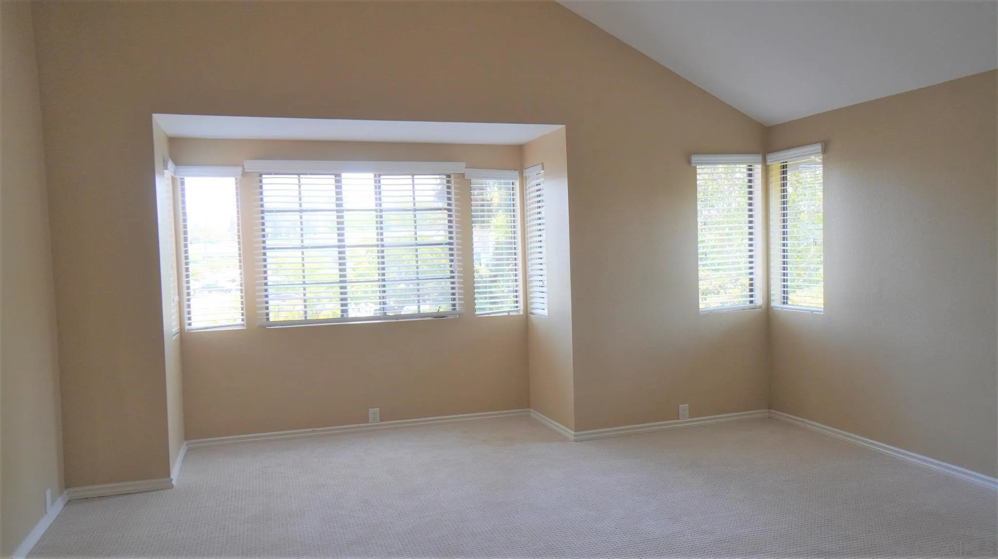 3195 Morning Way La Jolla, CA 92037 - Photo 6 of 18 an empty room with windows