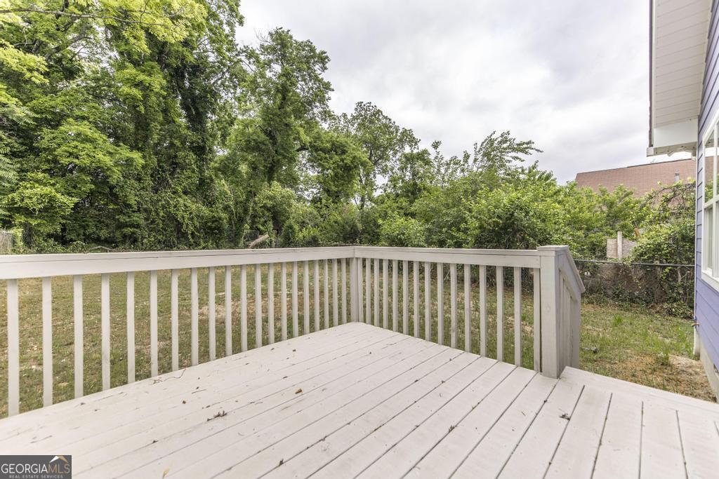 180 Ward Street Macon, GA 31204 - Photo 21 of 26 a view of balcony with wooden floor and fence