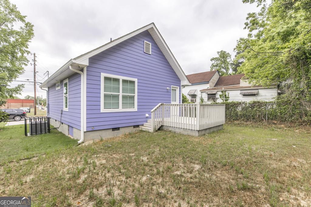 180 Ward Street Macon, GA 31204 - Photo 23 of 26 a view of a house with a yard and sitting area