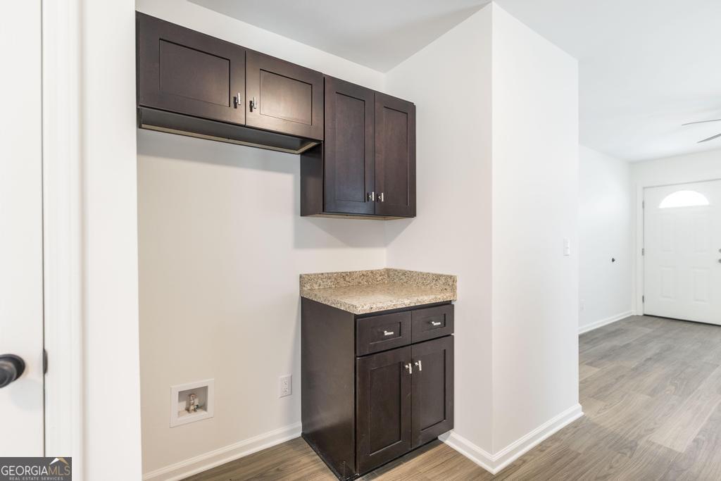 180 Ward Street Macon, GA 31204 - Photo 10 of 26 a view of cabinets with wooden floor