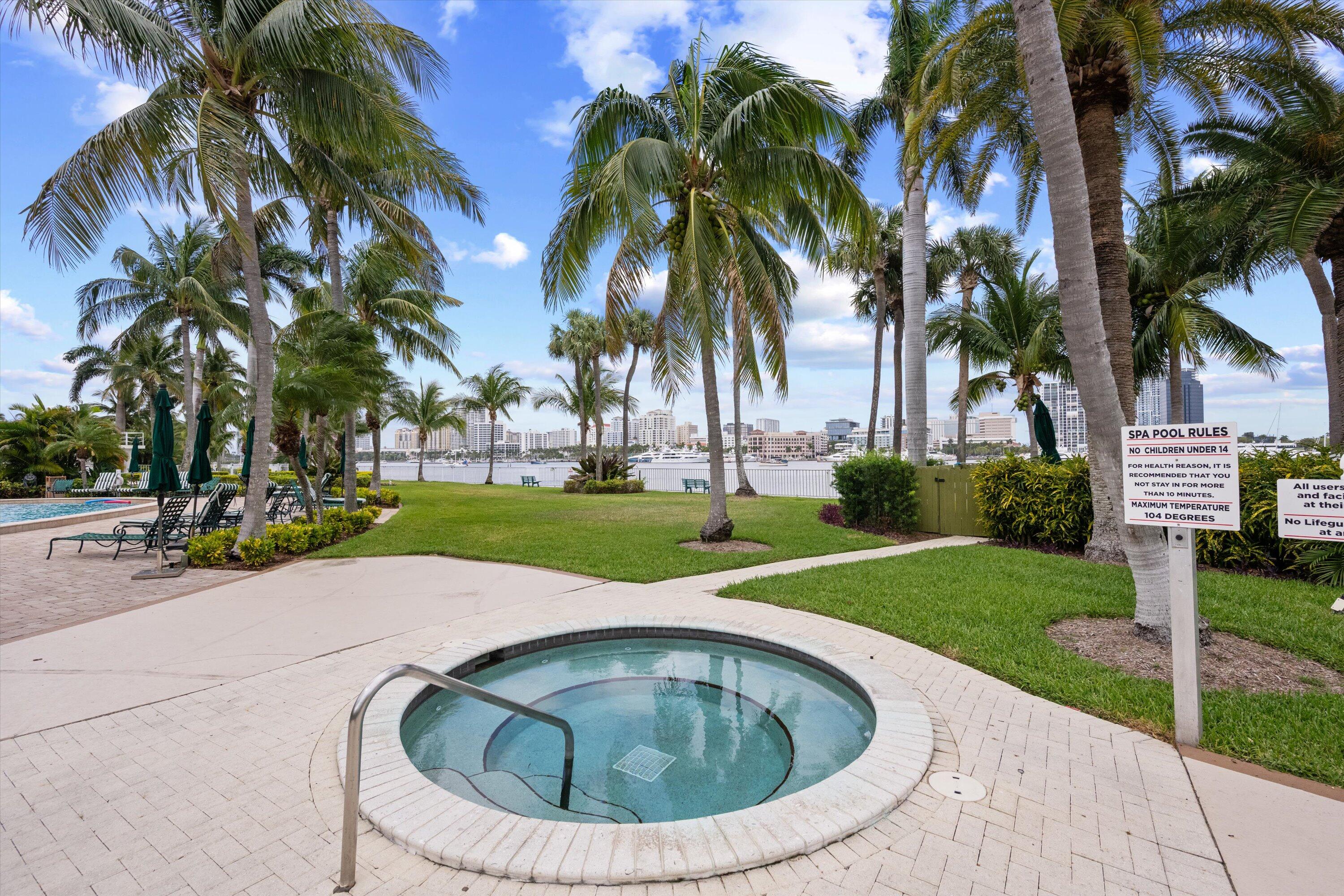 44 Cocoanut Row, Unit 514A Palm Beach, FL 33480 - Photo 31 of 34 a view of a house with a swimming pool