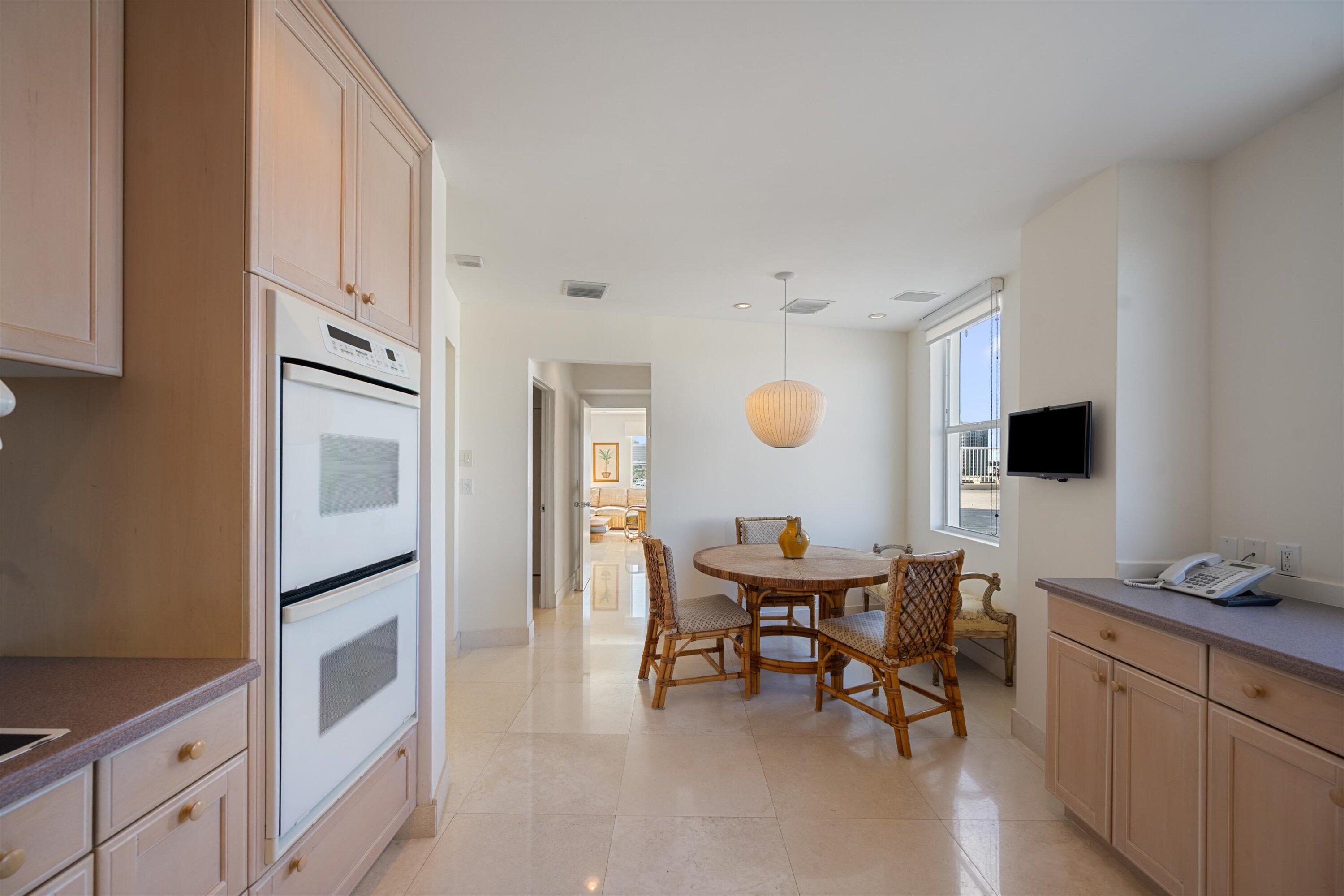 44 Cocoanut Row, Unit 514A Palm Beach, FL 33480 - Photo 8 of 34 a view of a workspace with furniture and mirror
