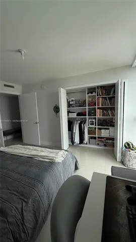 a living room with furniture and natural light