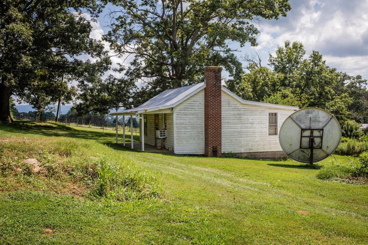 1557 Rinacas Corner Road Shenandoah, VA 22849 - Photo 14 of 32 a view of a house with a yard