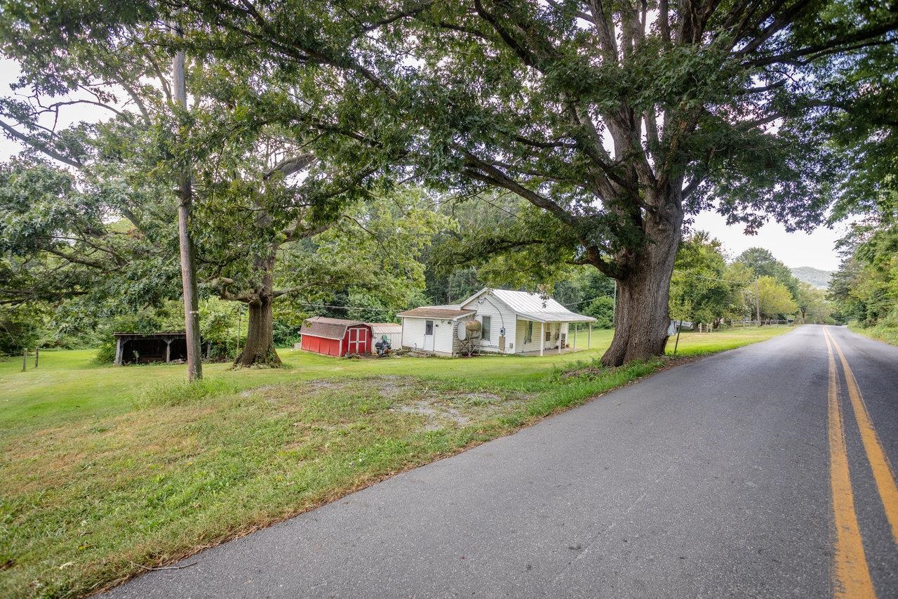 1557 Rinacas Corner Road Shenandoah, VA 22849 - Photo 23 of 32 a view of a house with a backyard