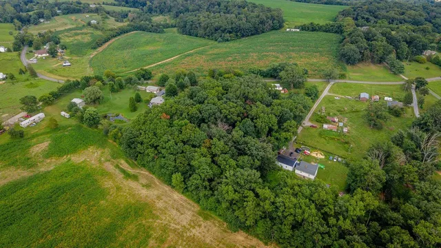a view of a garden with a building
