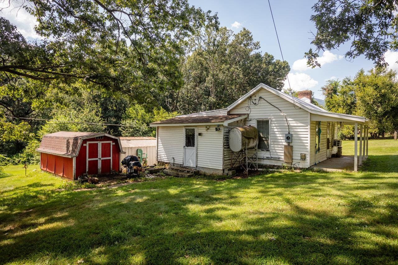 1557 Rinacas Corner Road Shenandoah, VA 22849 - Photo 3 of 32 a view of a house with a yard and sitting area