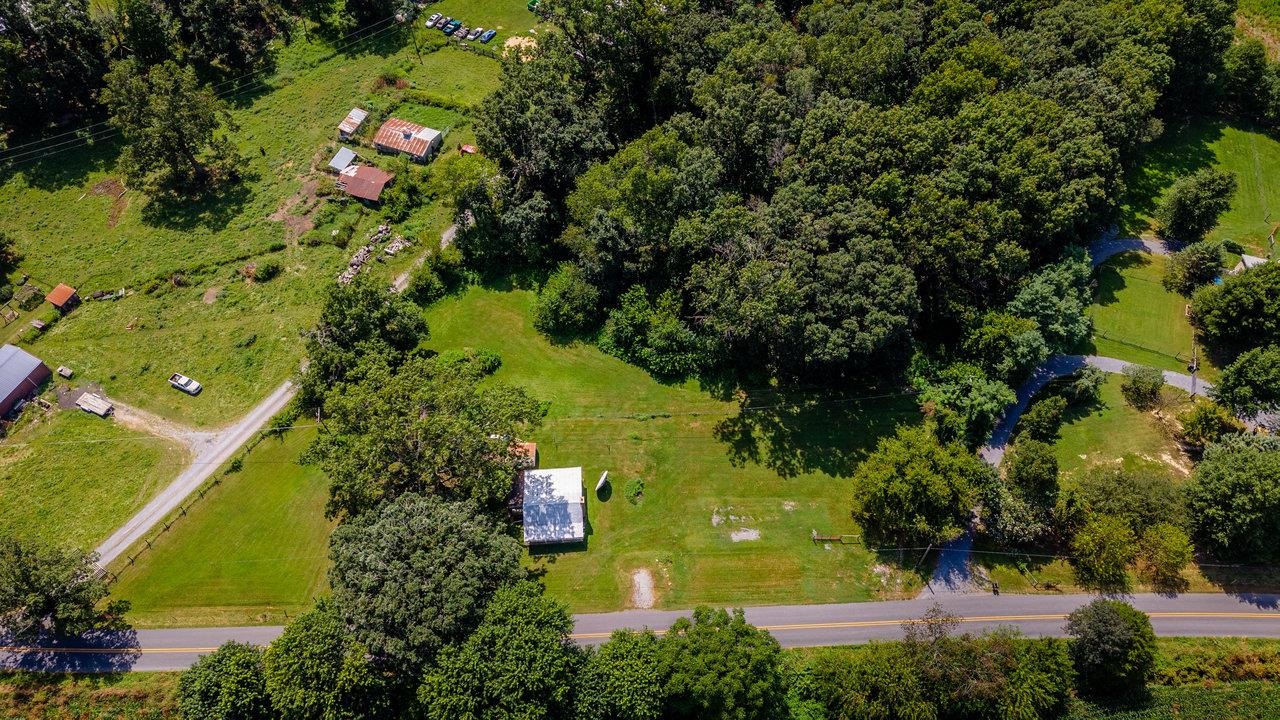 1557 Rinacas Corner Road Shenandoah, VA 22849 - Photo 31 of 32 a view of a lake with a yard