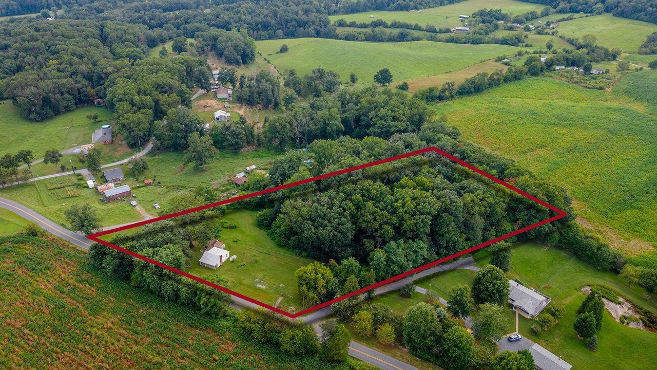 1557 Rinacas Corner Road Shenandoah, VA 22849 - Photo 4 of 32 an aerial view of a golf course with swimming pool and outdoor space