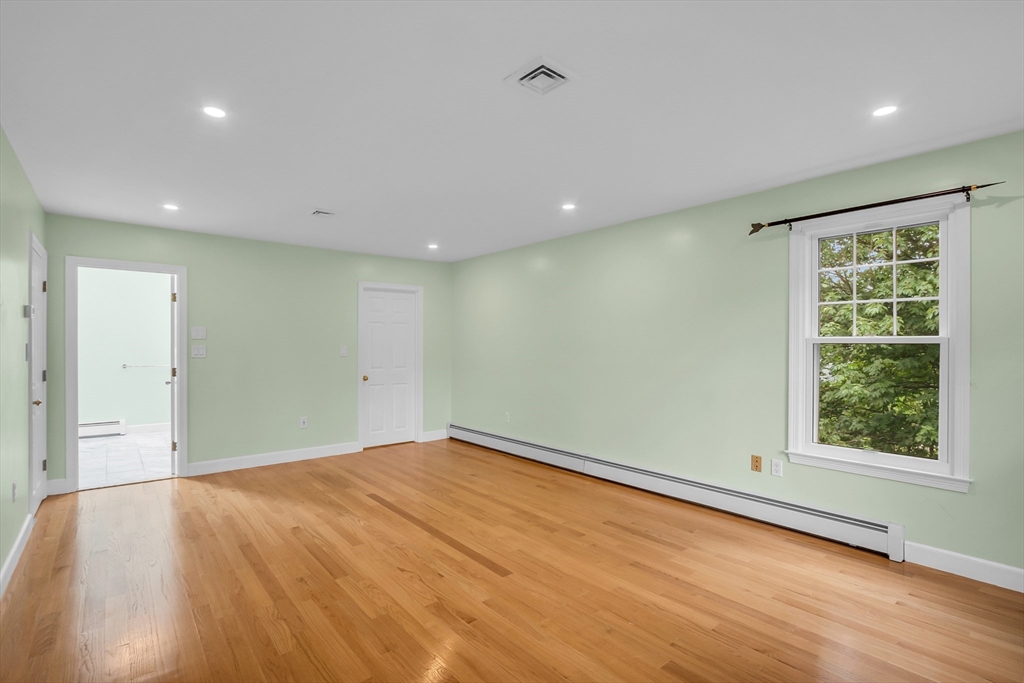 7 Apple Ridge Drive Natick, MA 01760 - Photo 18 of 42 a view of an empty room with a window