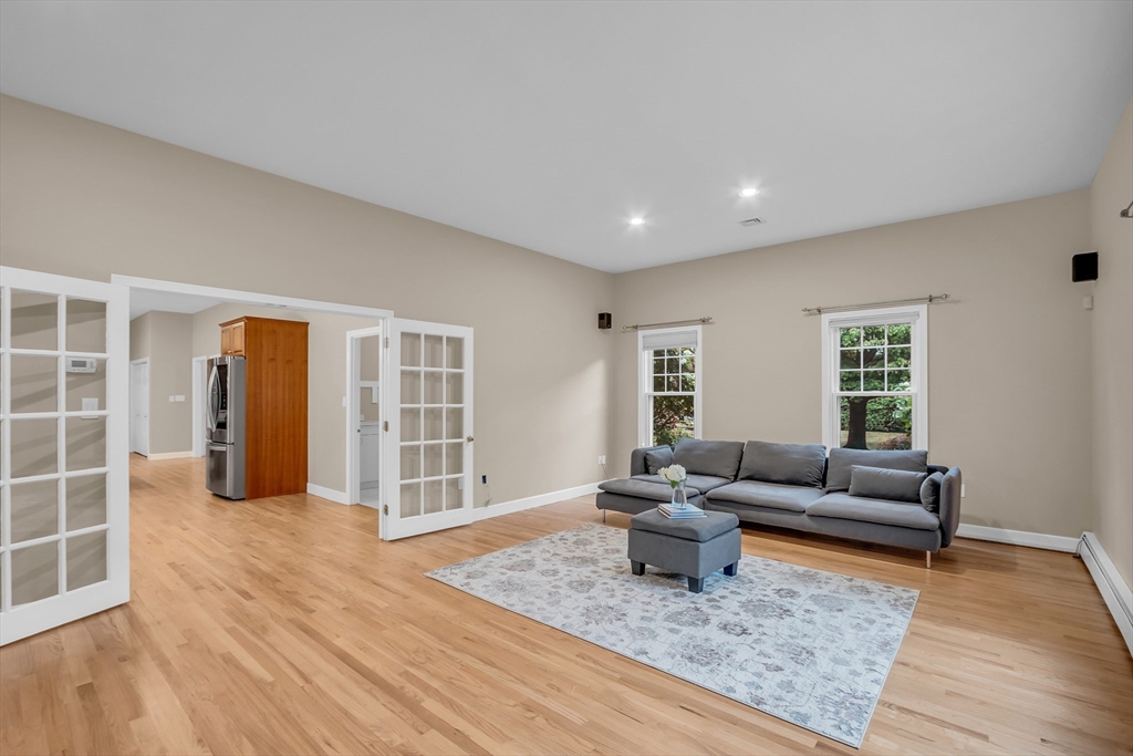 7 Apple Ridge Drive Natick, MA 01760 - Photo 23 of 42 a living room with furniture and wooden floor