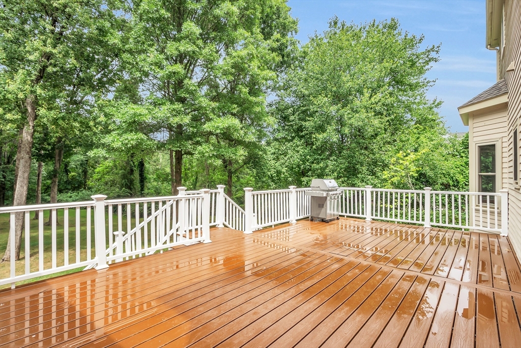 7 Apple Ridge Drive Natick, MA 01760 - Photo 29 of 42 a view of balcony with wooden floor and fence