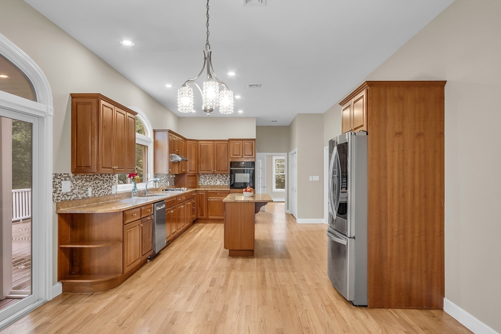 7 Apple Ridge Drive Natick, MA 01760 - Photo 3 of 42 a large kitchen with a lot of counter space and stainless steel appliances