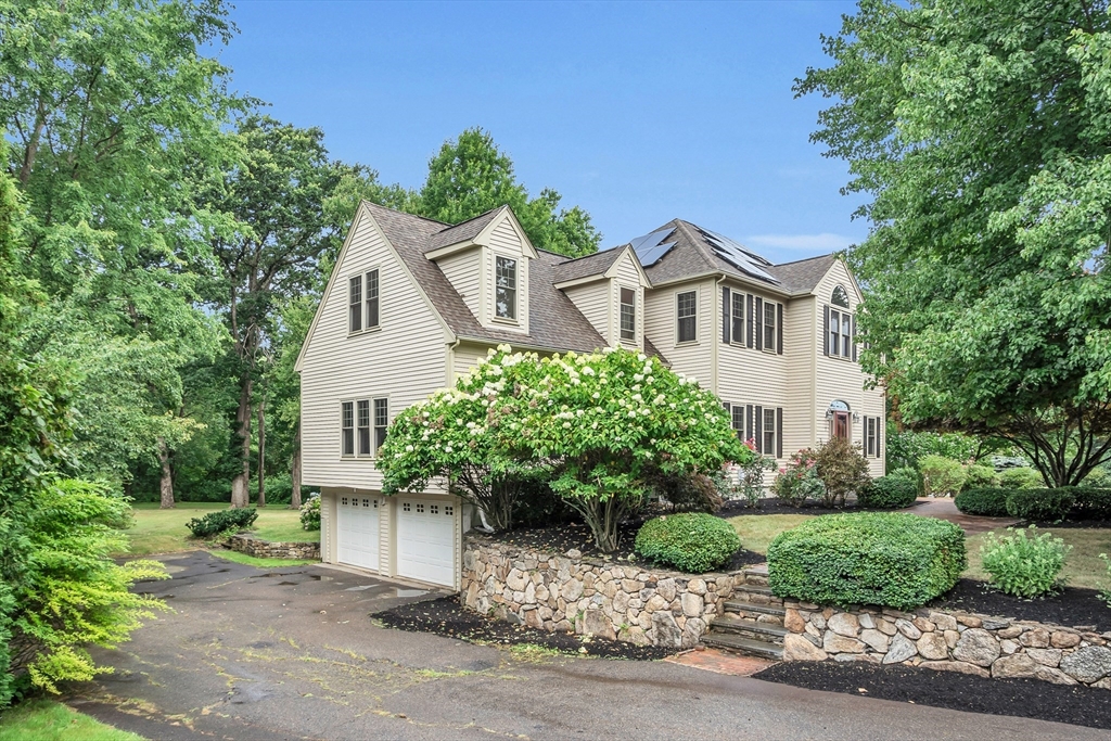 7 Apple Ridge Drive Natick, MA 01760 - Photo 31 of 42 front view of a house with a yard