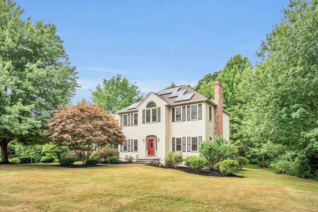 7 Apple Ridge Drive Natick, MA 01760 - Photo 33 of 42 a front view of a house with a garden