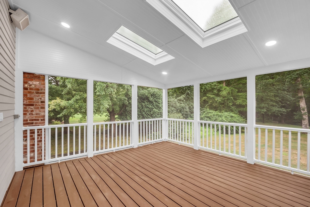 7 Apple Ridge Drive Natick, MA 01760 - Photo 7 of 42 a view of balcony with wooden floor