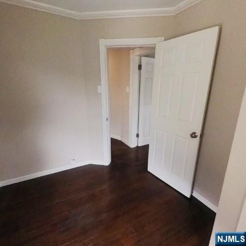 167 James Street Hackensack, NJ 07601 - Photo 23 of 30 an empty room with wooden floor