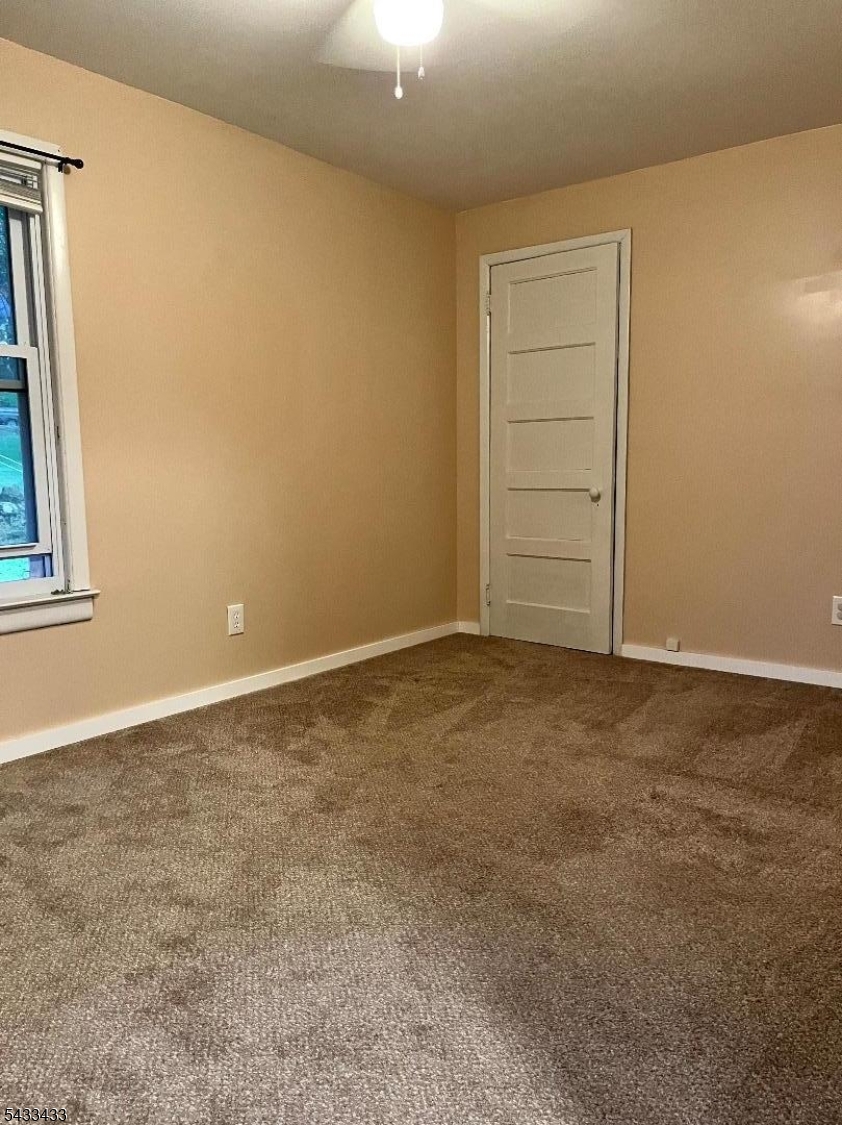 30 Fowler Street Franklin, NJ 07416 - Photo 18 of 27 an empty room with windows