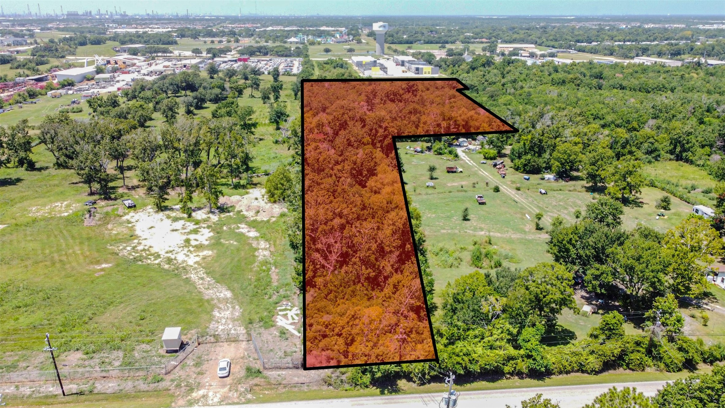 5307 Barkaloo Road Baytown, TX 77521 - Photo 2 of 5 an aerial view of residential houses with outdoor space and trees