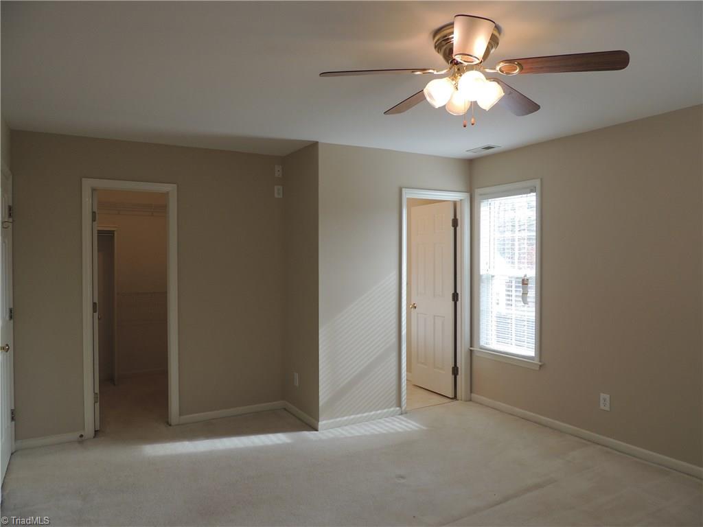 7606 Keating Drive Oak Ridge, NC 27310 - Photo 20 of 30 Master Bedroom