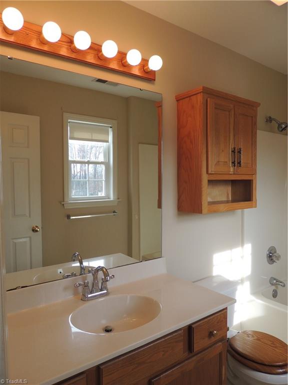 7606 Keating Drive Oak Ridge, NC 27310 - Photo 22 of 30 Master bath