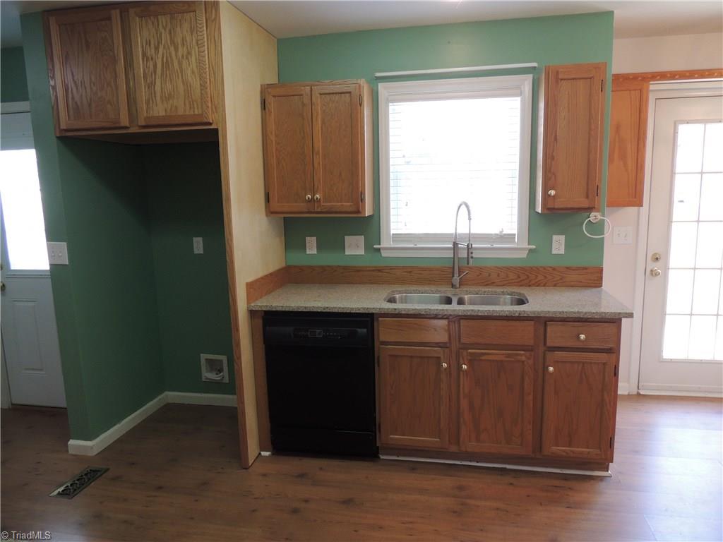 7606 Keating Drive Oak Ridge, NC 27310 - Photo 6 of 30 Kitchen sink area