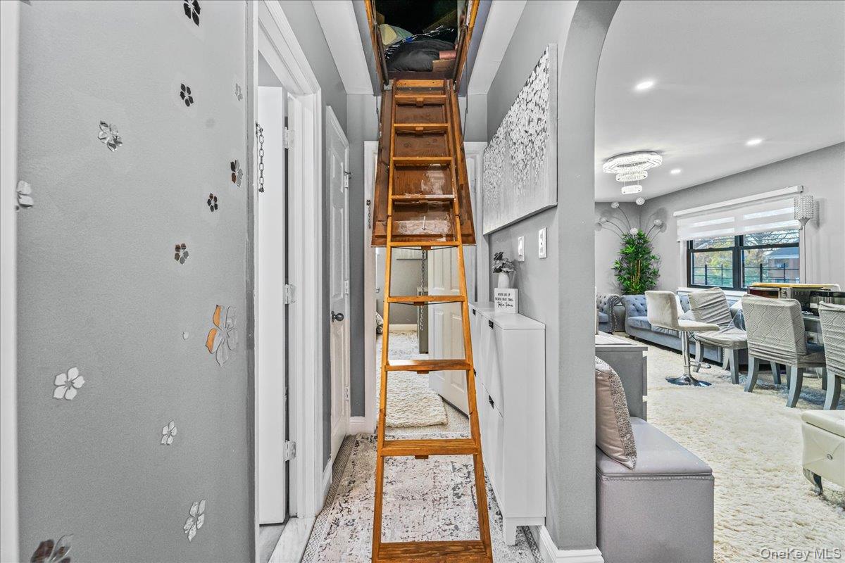 217-08 73rd Avenue, Unit 383A2 Queens, NY 11364 - Photo 17 of 24 a view of a hallway with dining area and entryway
