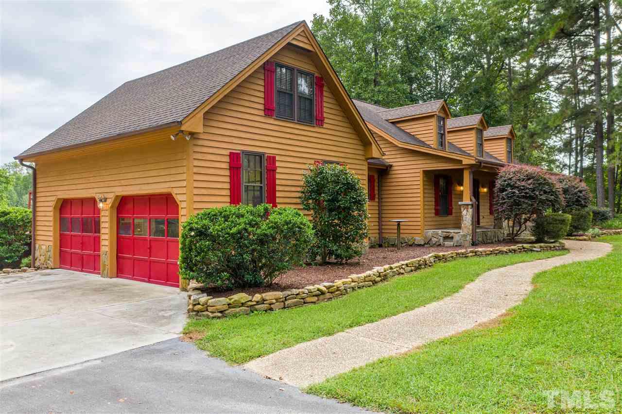 7010 Farmdale Road Raleigh, NC 27610 - Photo 2 of 30 a front view of house with yard