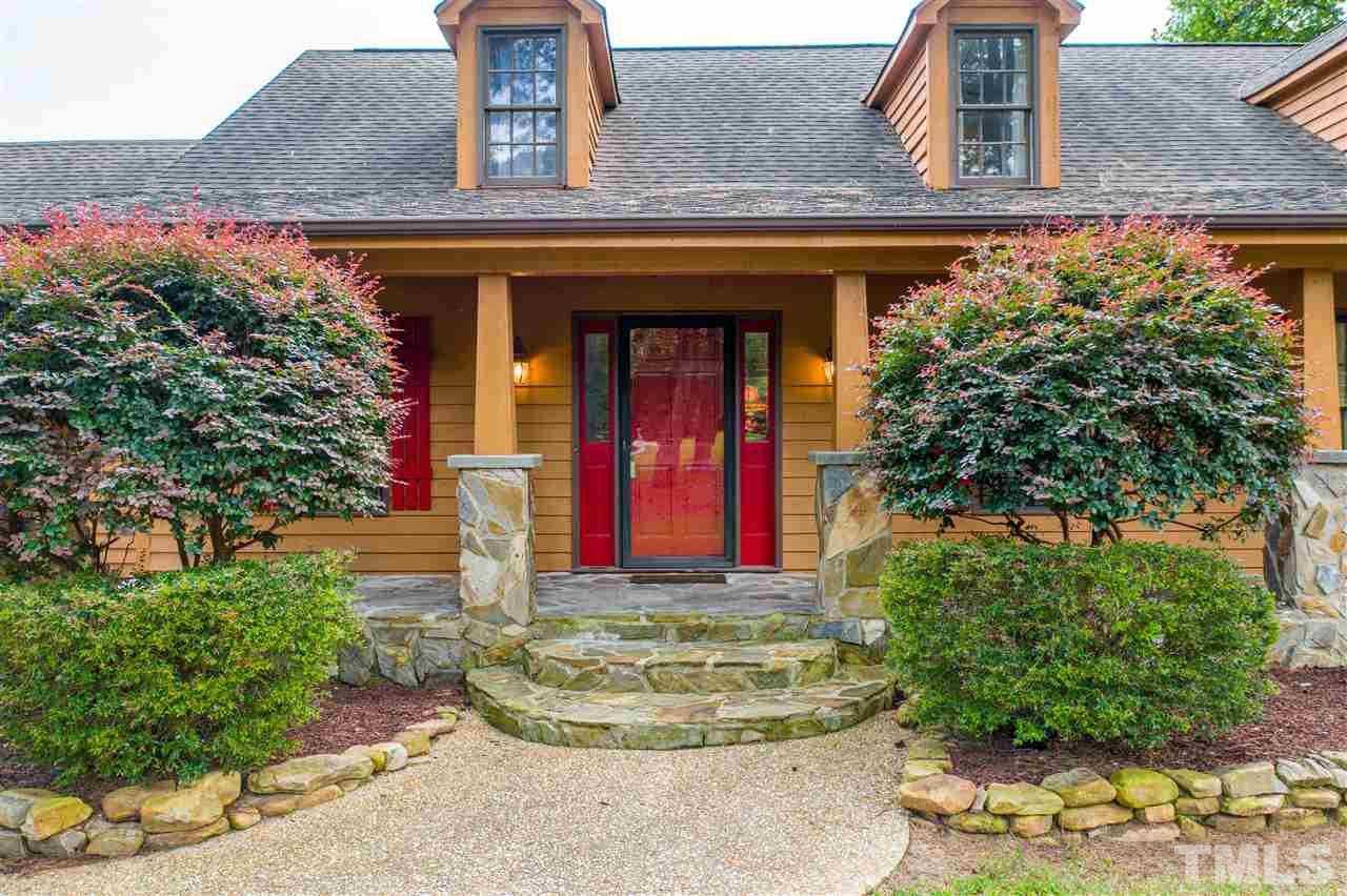7010 Farmdale Road Raleigh, NC 27610 - Photo 4 of 30 a front view of a house
