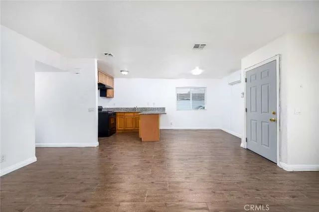 a view of kitchen with wooden floor