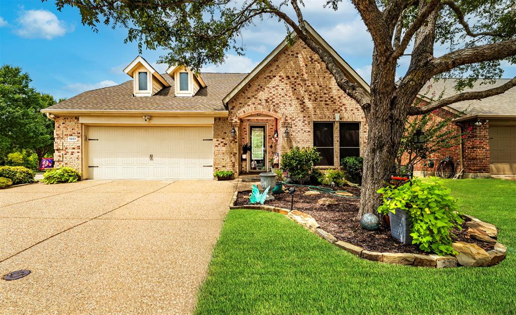 1601 Meadow Ranch Road McKinney, TX 75071 - Photo 1 of 31 Brick exterior with gabled roofline and dormer windows