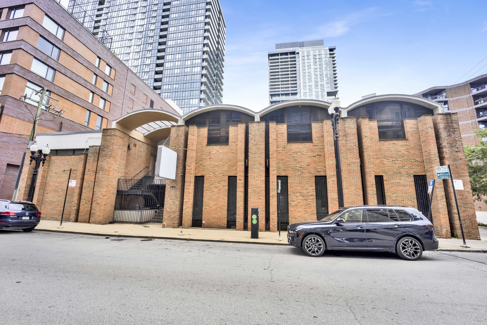 a view of car parked in front of building