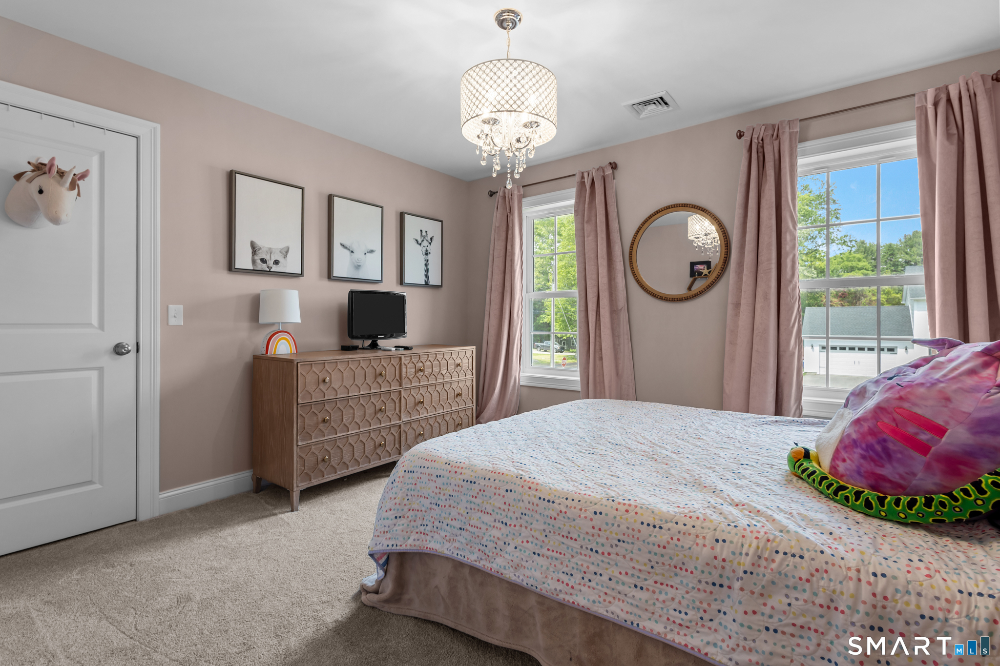 2 Martys Way Gales Ferry, CT 06335 - Photo 24 of 40 a bedroom with a bed mirror and window