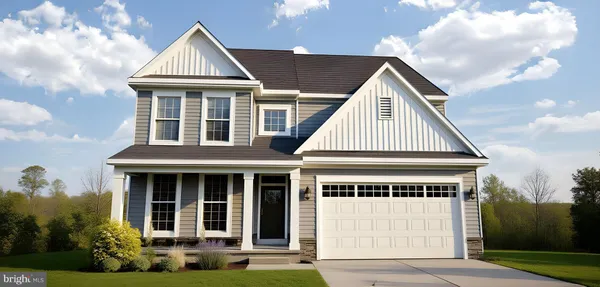 a view of house with yard