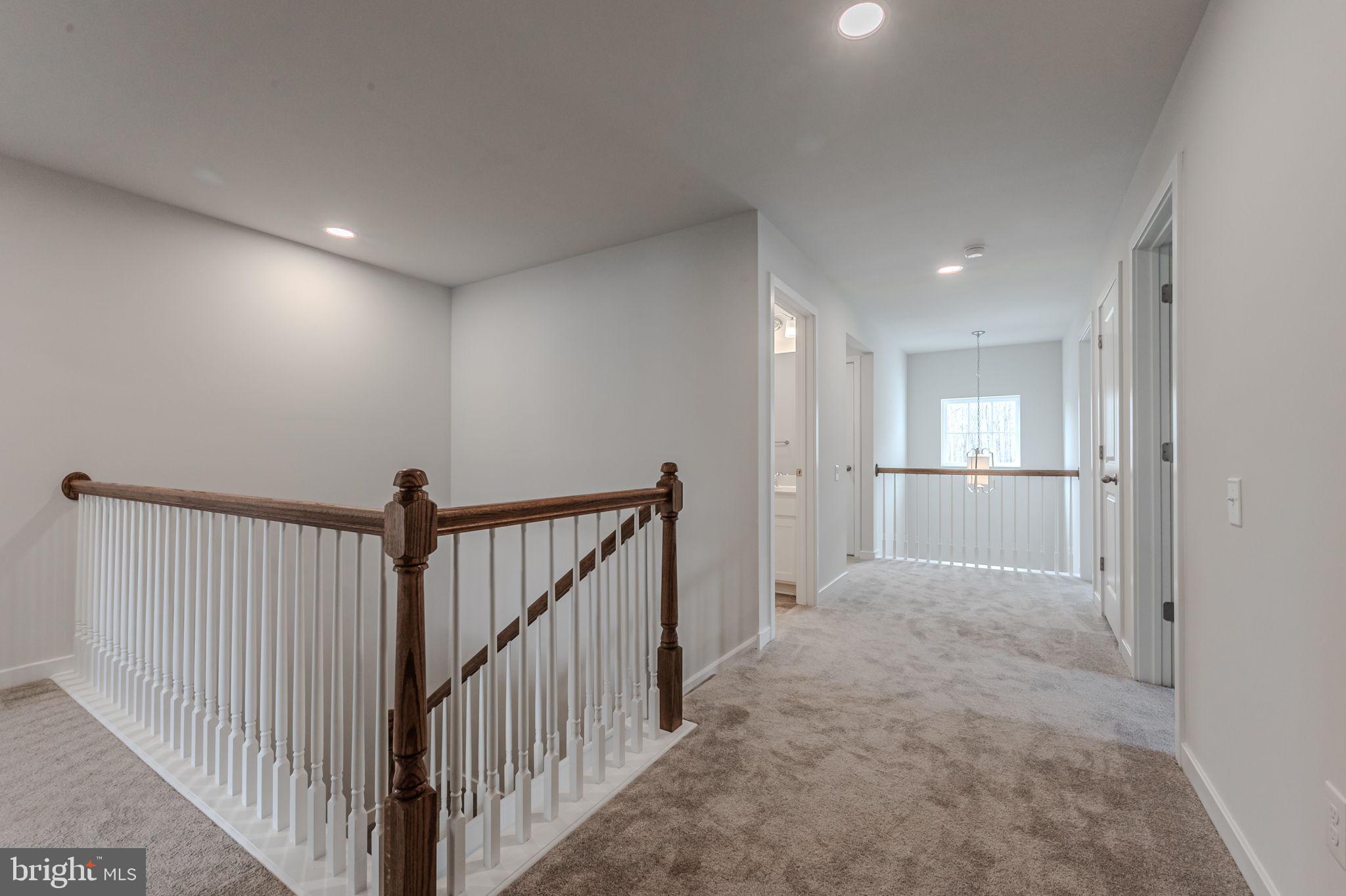 422 Bellflower Way, Unit CHALFONT Townsend, DE 19734 - Photo 17 of 21 a view of a hallway