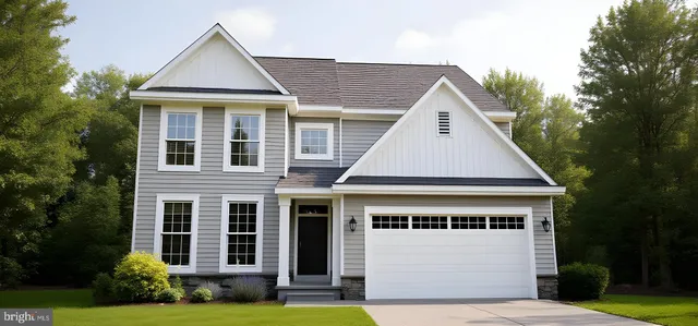 a view of house with yard