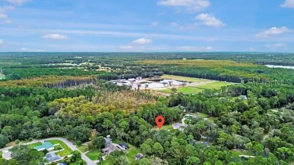 a view of a houses with yard
