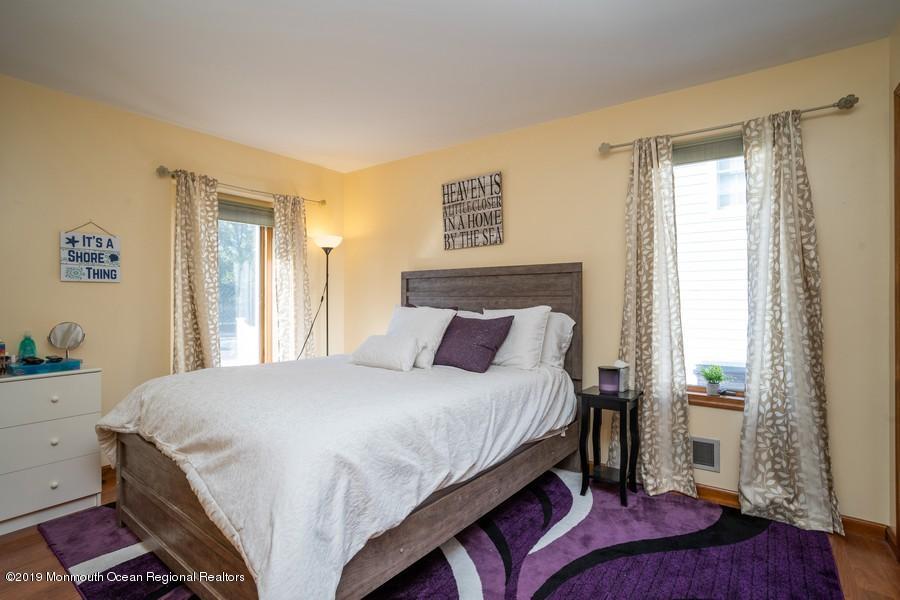 140 Cedar Run Road Bayville, NJ 08721 - Photo 5 of 18 a bedroom with a bed and a window