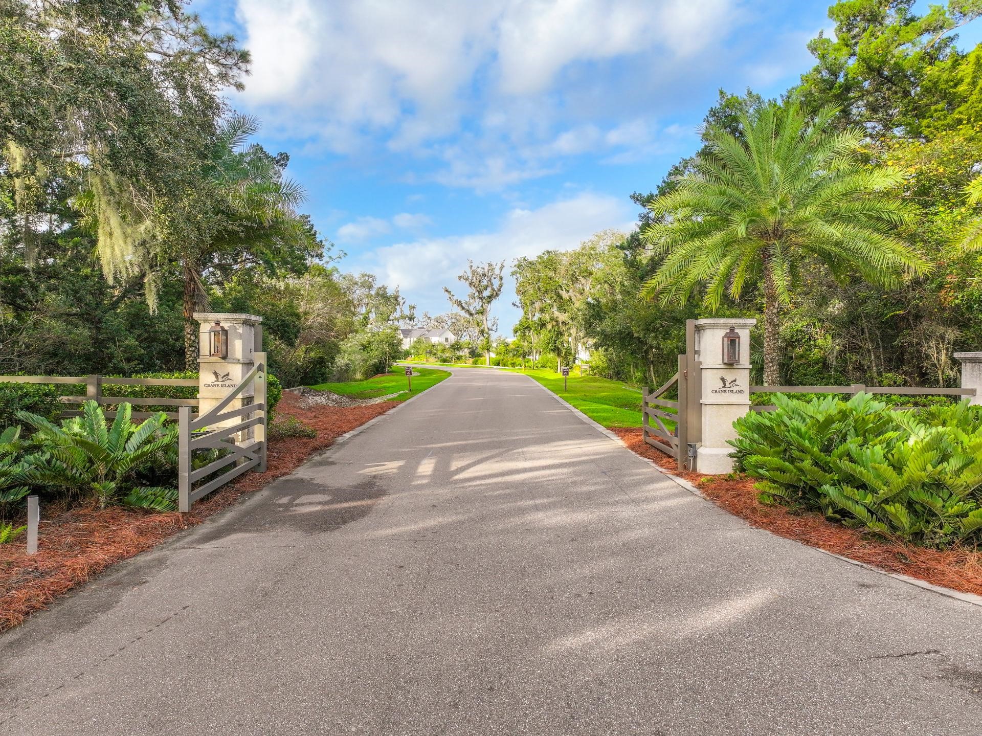 99 Marsh Court Fernandina Beach, FL 32034 - Photo 23 of 24 a view of a street with a bench and trees