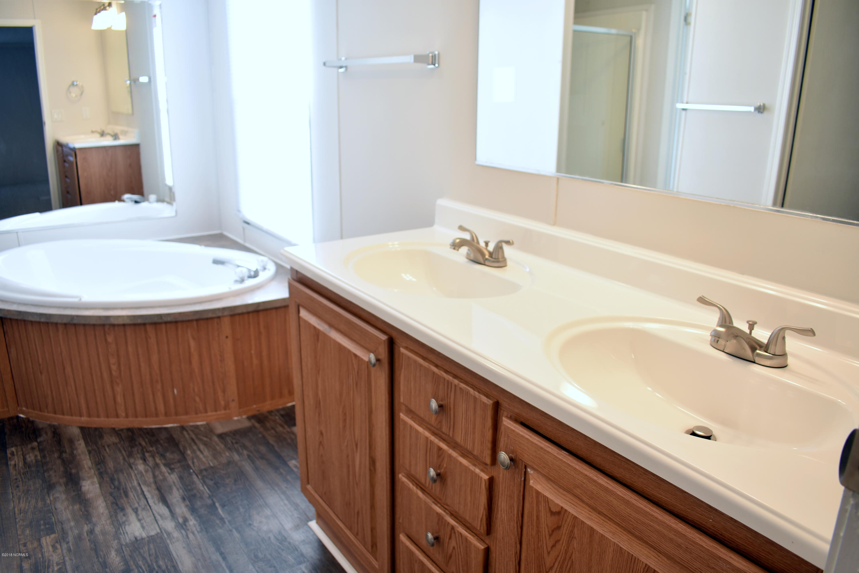 8629 Ransom Lane Kenly, NC 27542 - Photo 11 of 19 Separate Garden Tub, Shower & Double Vanities