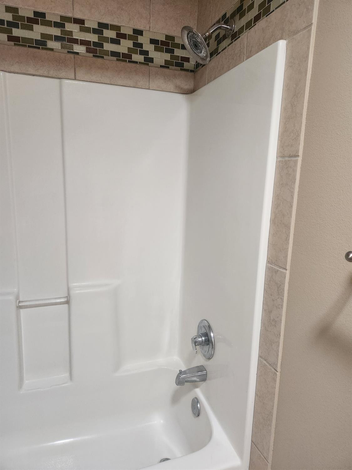 2109 21st Street, Unit 2 Lubbock, TX 79411 - Photo 14 of 21 a bathroom with a bathtub