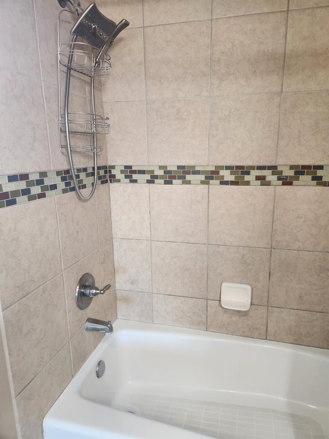 2109 21st Street, Unit 2 Lubbock, TX 79411 - Photo 15 of 21 a bathroom with a bathtub