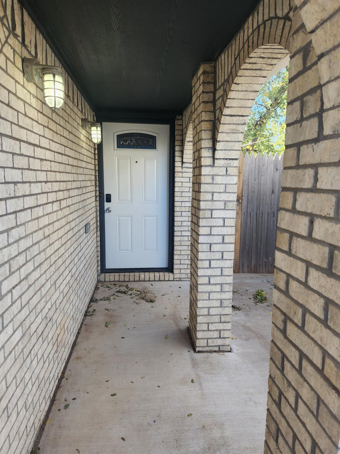 2109 21st Street, Unit 2 Lubbock, TX 79411 - Photo 2 of 21 a view of wooden door