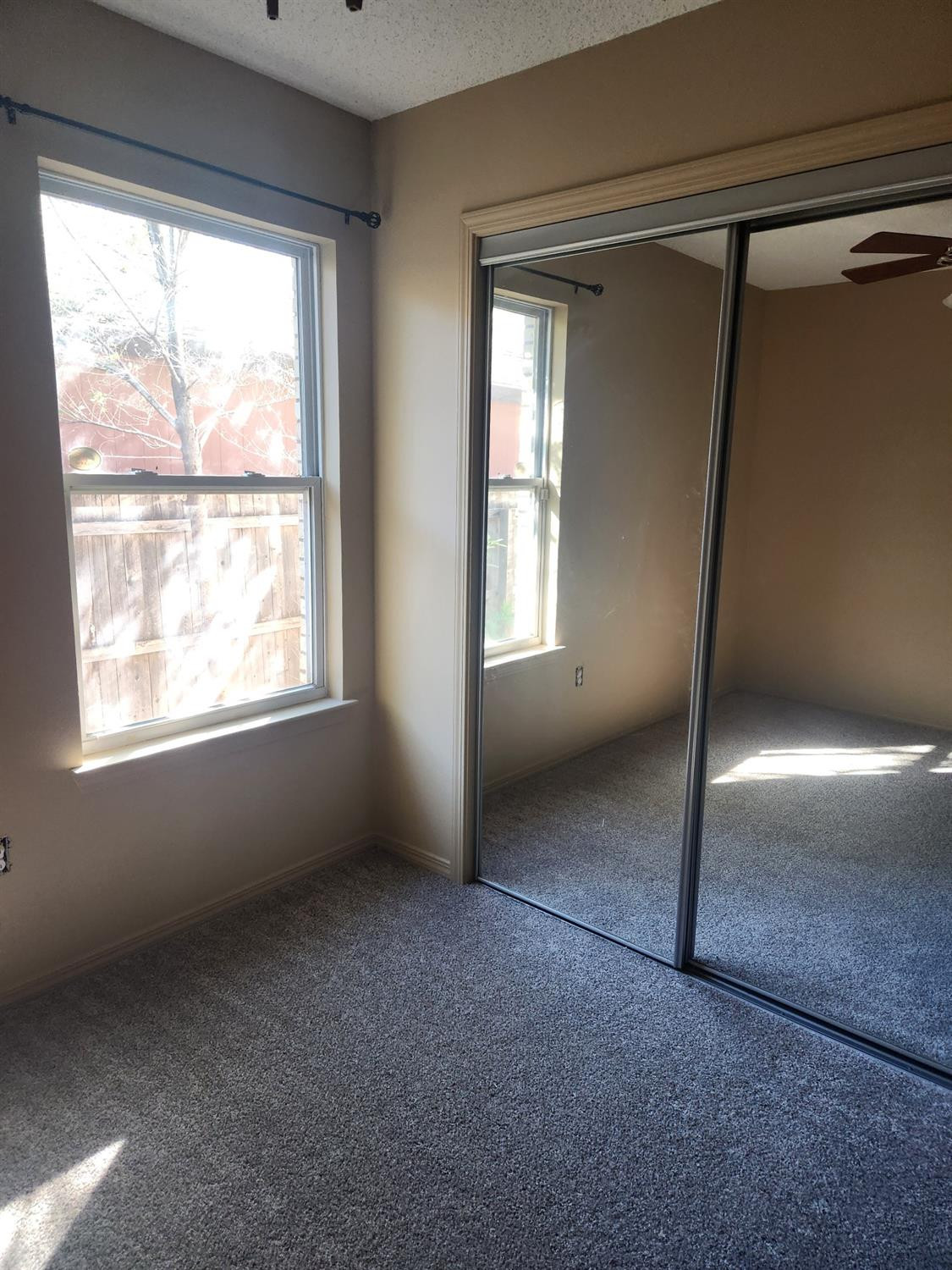 2109 21st Street, Unit 2 Lubbock, TX 79411 - Photo 10 of 21 a view of empty room with window