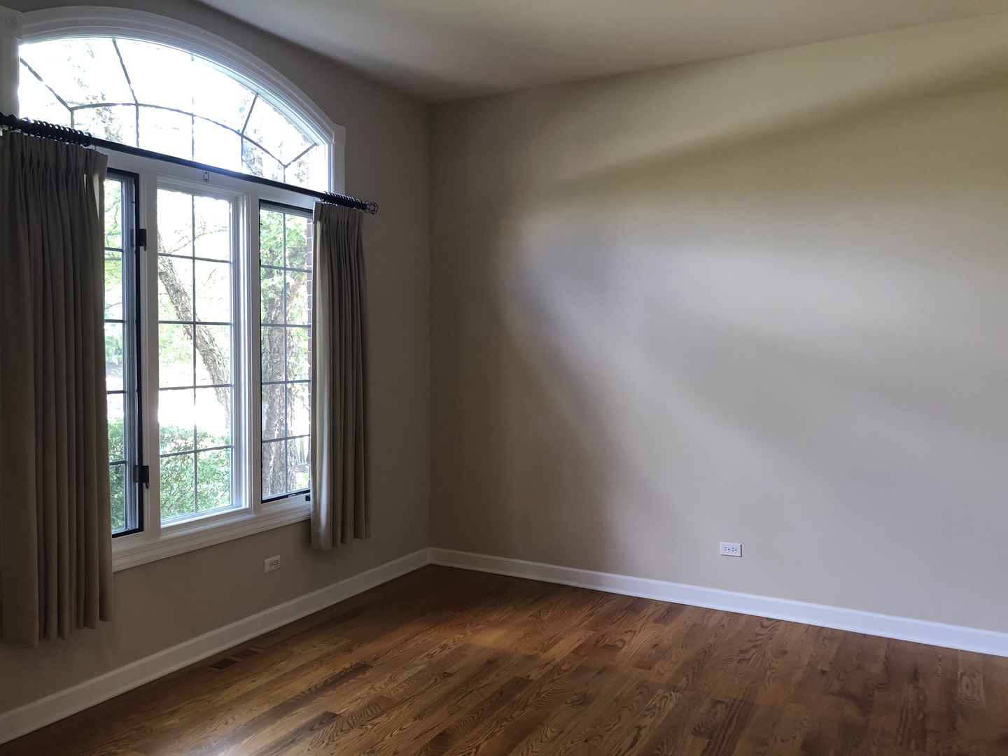38 Long Cove Drive Lemont, IL 60439 - Photo 11 of 24 an empty room with wooden floor and windows