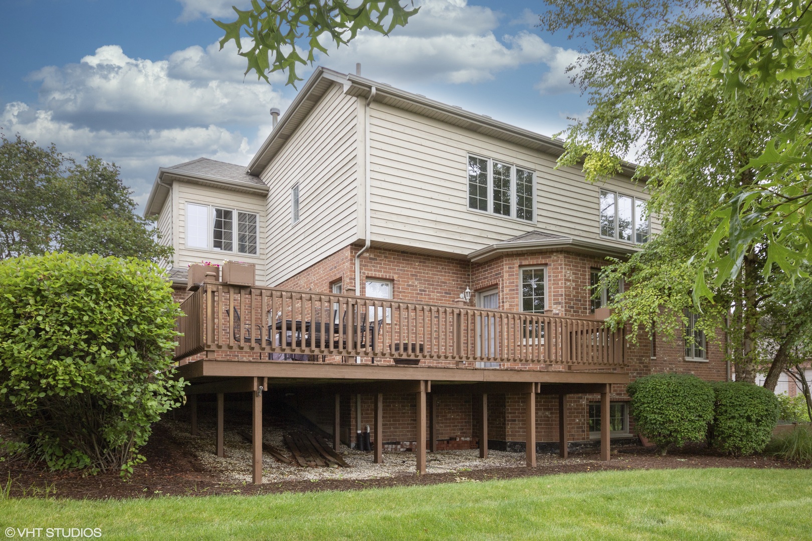 38 Long Cove Drive Lemont, IL 60439 - Photo 23 of 24 a front view of a house with garden and porch