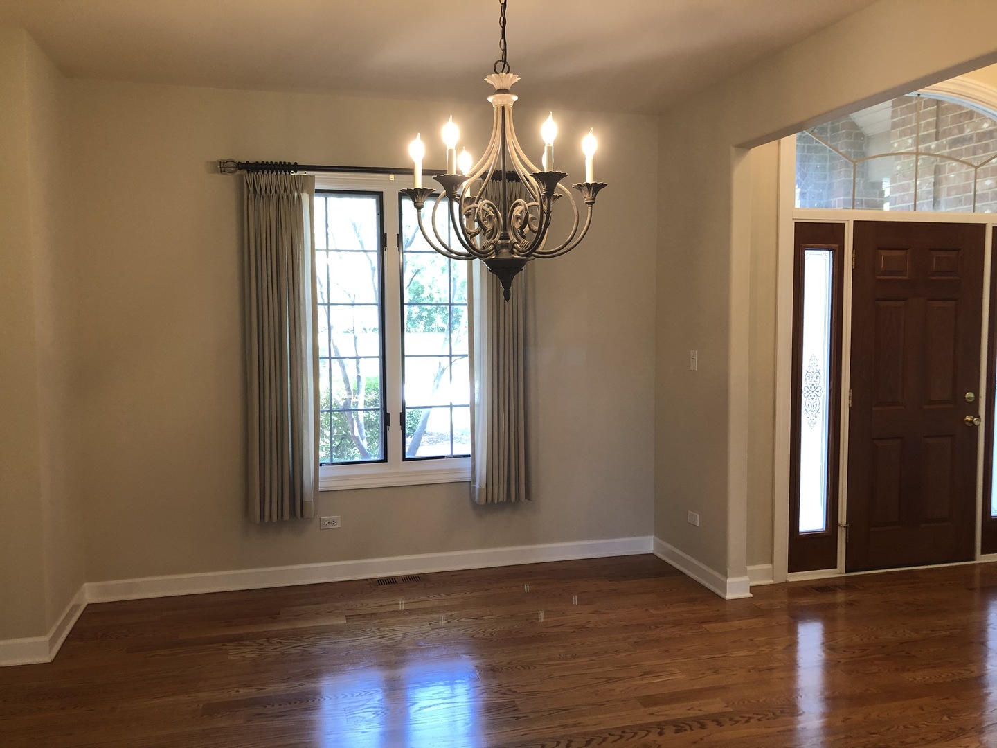 38 Long Cove Drive Lemont, IL 60439 - Photo 7 of 24 a view of empty room with wooden floor and fan