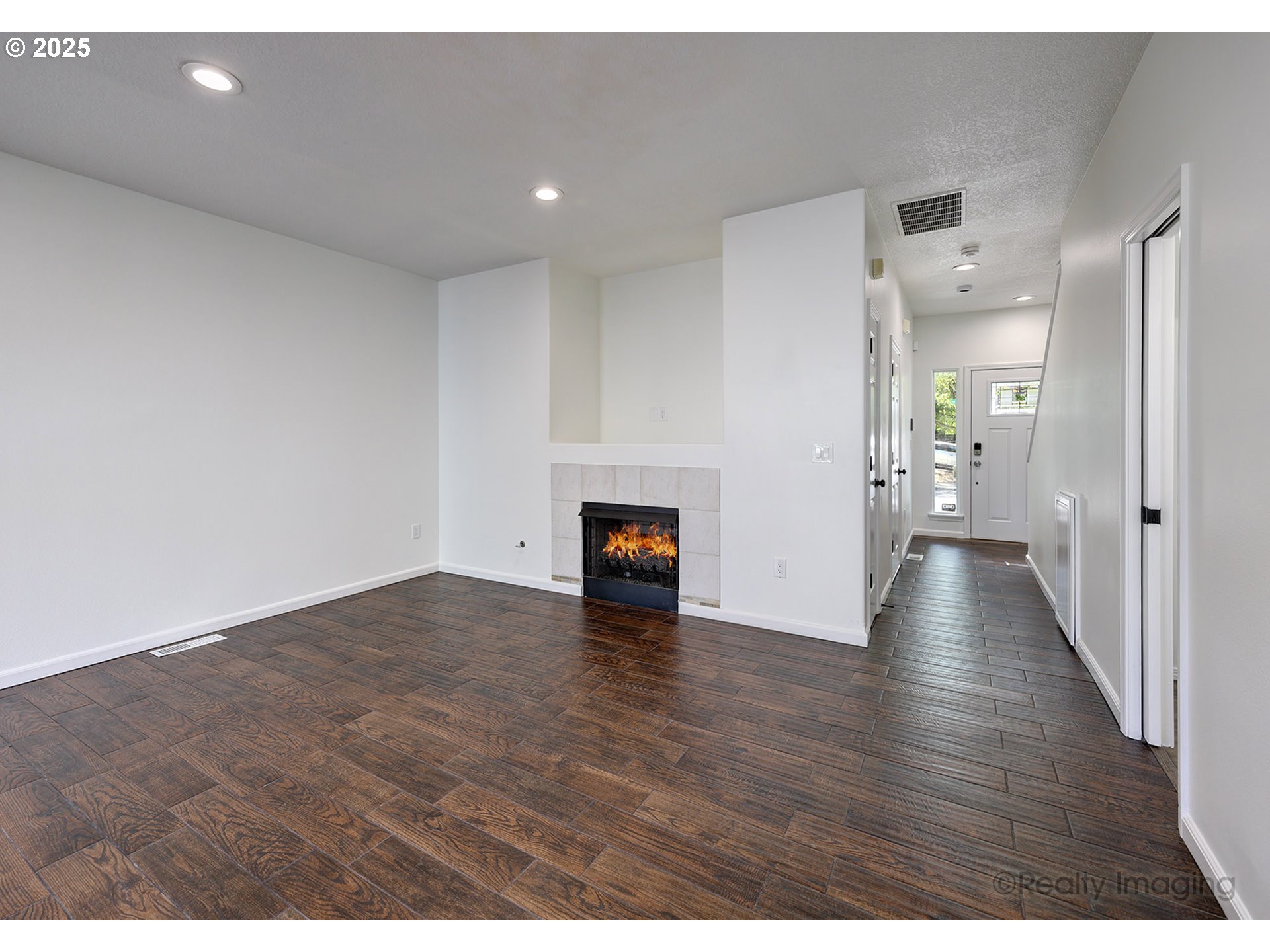 17893 Southwest Wakem Street Beaverton, OR 97003 - Photo 2 of 16 a view of empty room with wooden floor